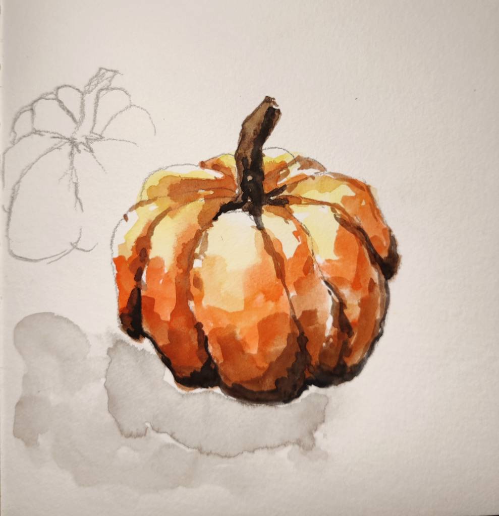 Un croquis de potiron trèèèès vite fait et un croquis à l'aquarelle allant du jaune pâle au noir